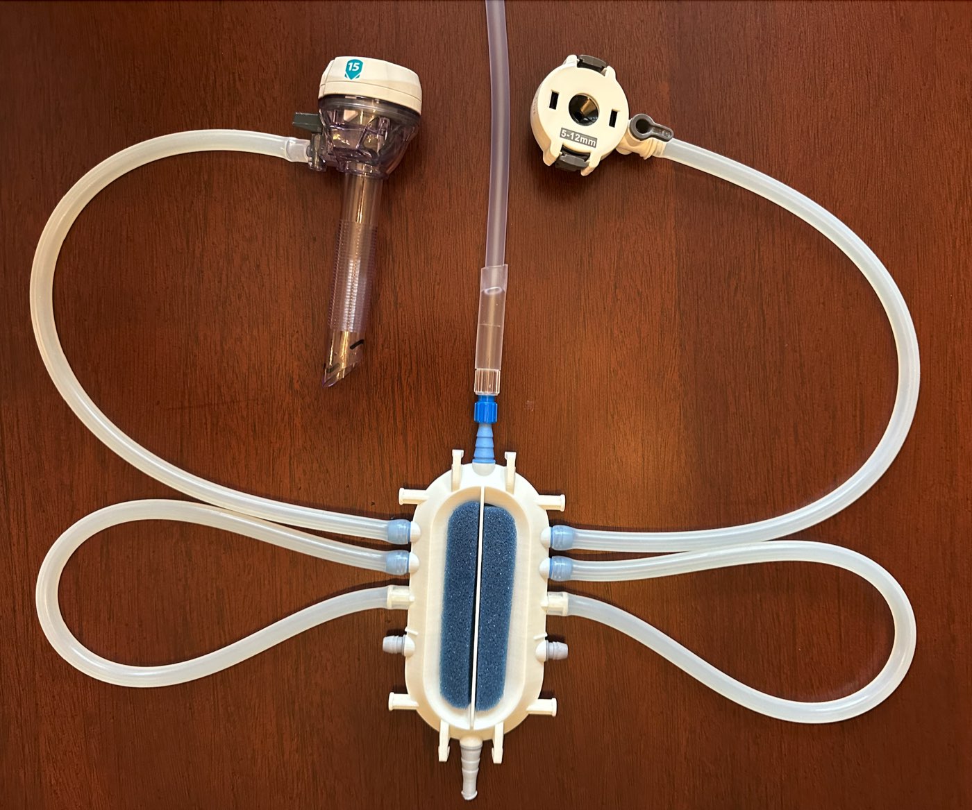 PneumoHub insufflation distribution system with tubing set and laparoscopic trocars